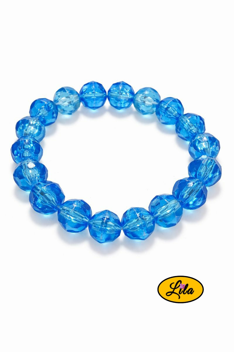 Bracelet grosses perles bleues vintage sur fond blanc vue produit