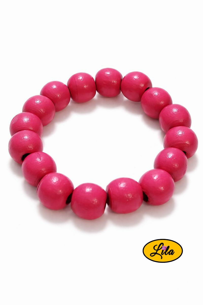 Bracelet perles bois rose foncé sur fond blanc vue produit