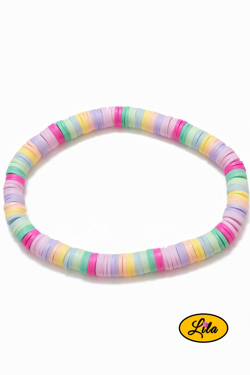 Bracelet perles Heishi rose pastel sur fond blanc vue produit