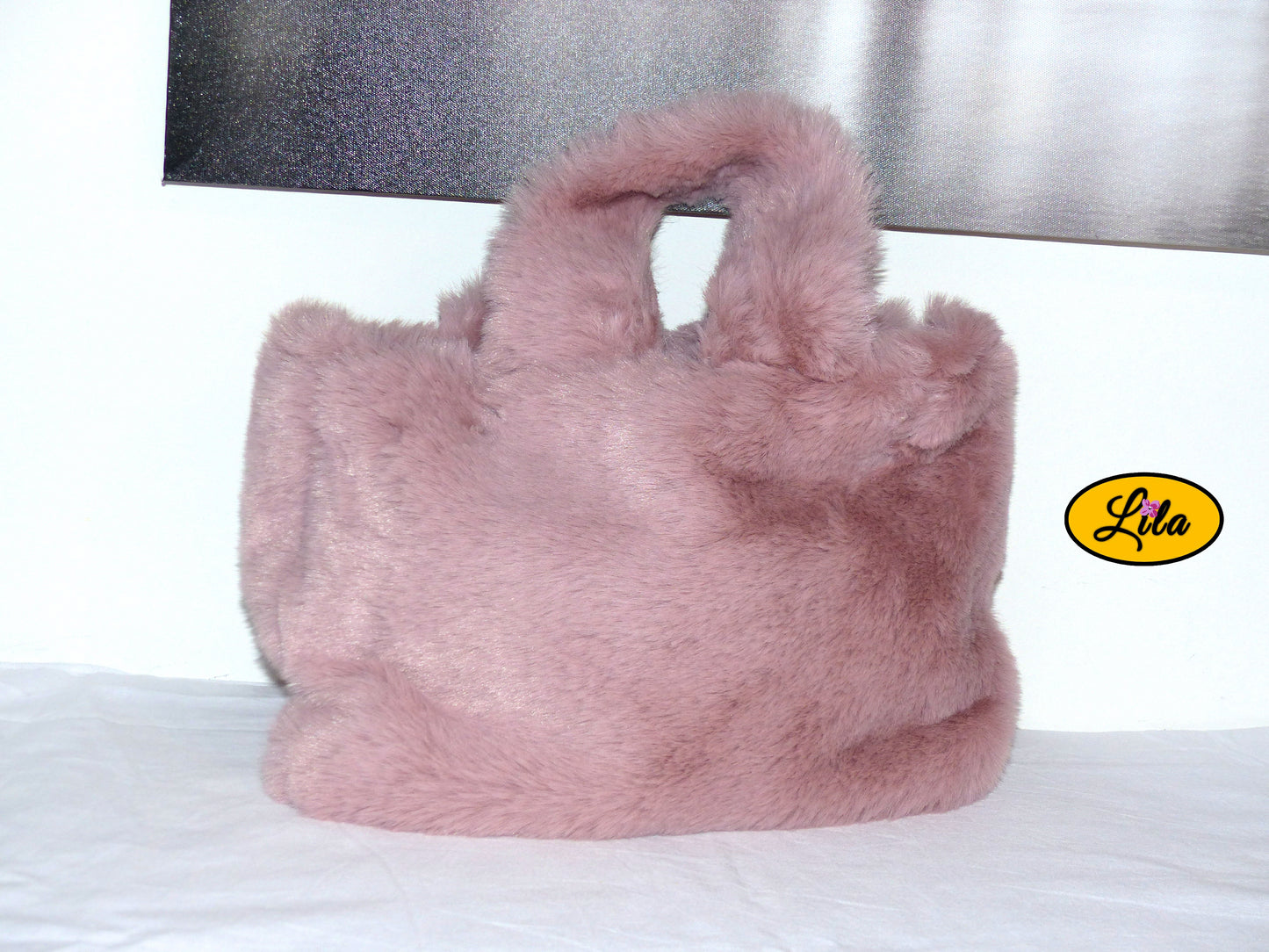Sac fausse fourrure vieux rose