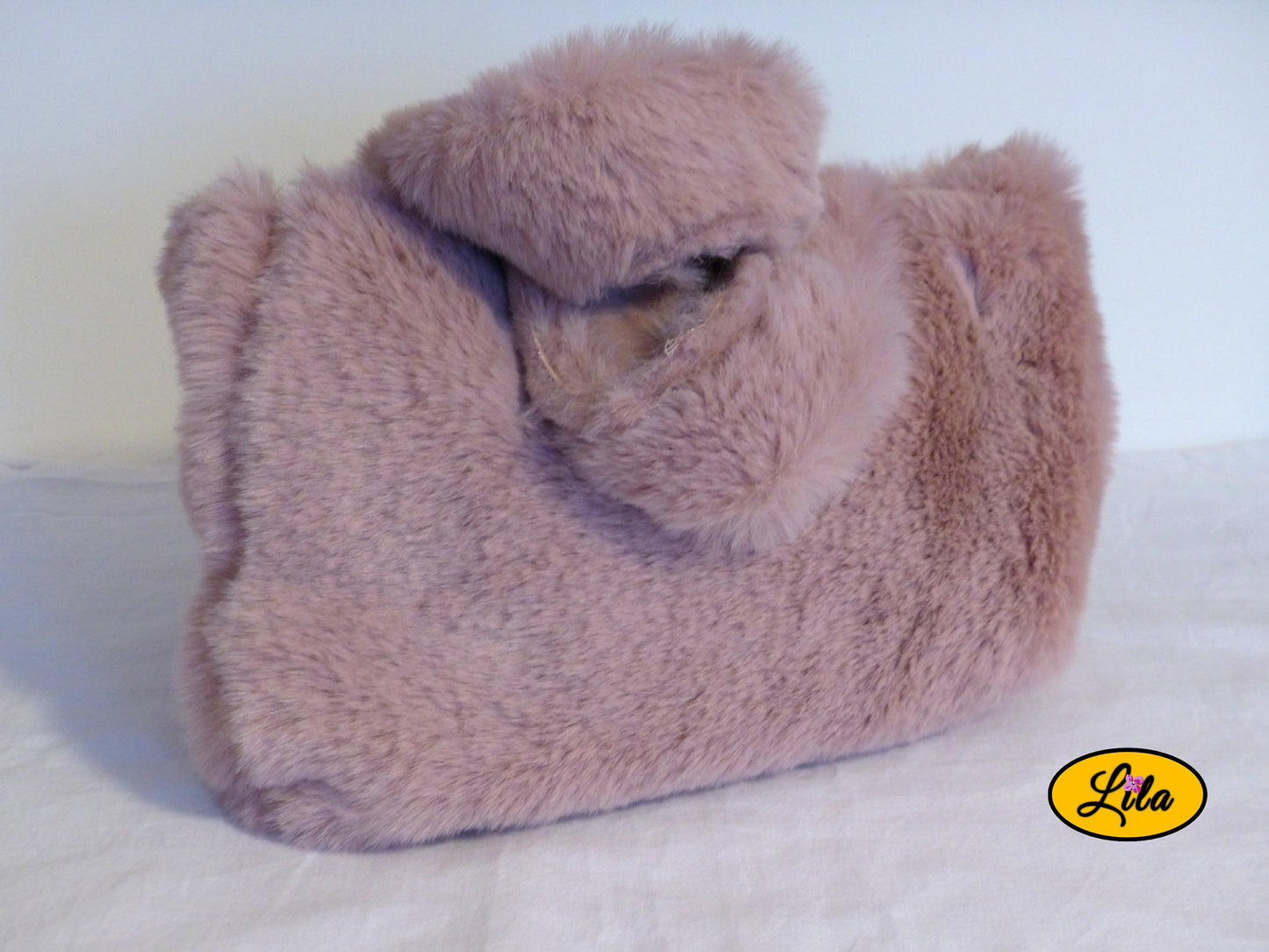 Sac fausse fourrure vieux rose