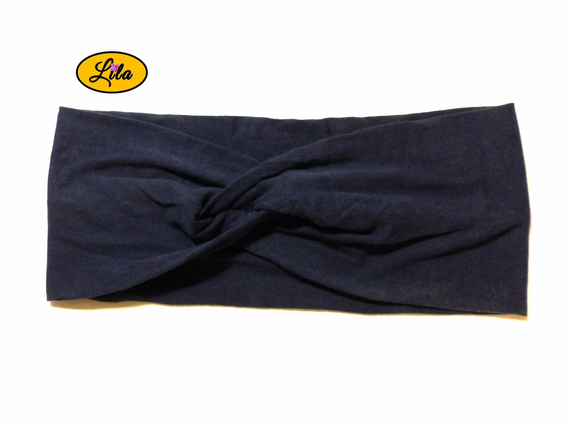 Bandeau en tissu bleu foncé vu de face sur fond blanc style élégant et moderne