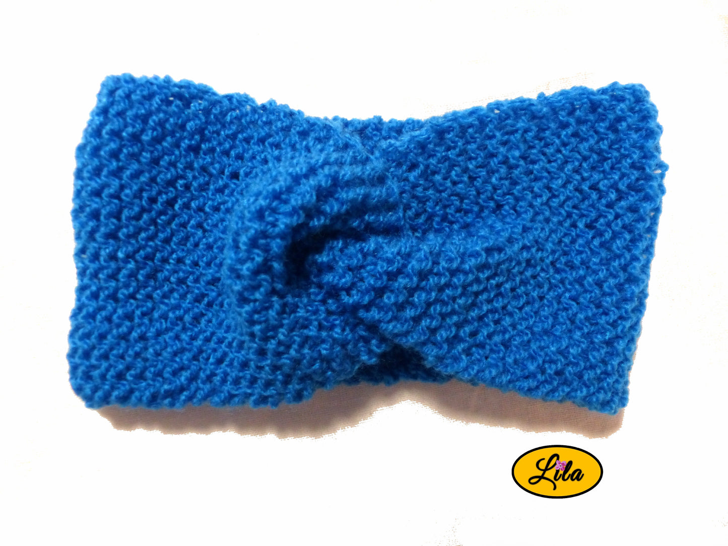 Bandeau en laine bleu vue de face sur fond blanc style hiver classique et moderne
