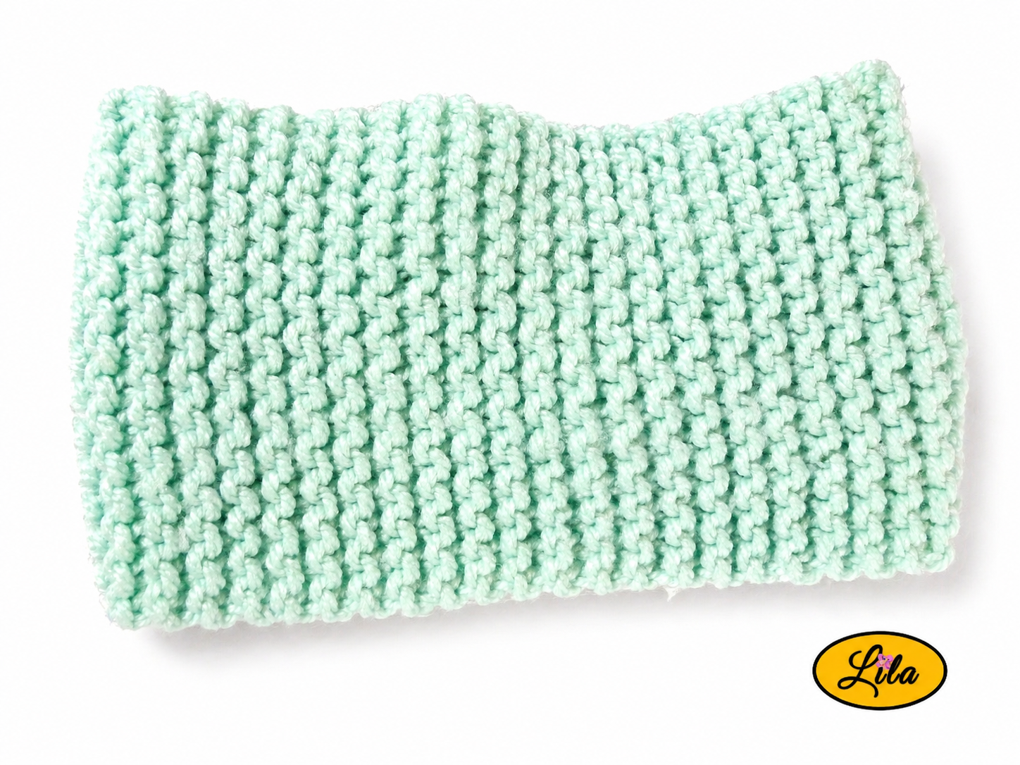 Bandeau en laine large vert pastel vue de dos sur fond blanc