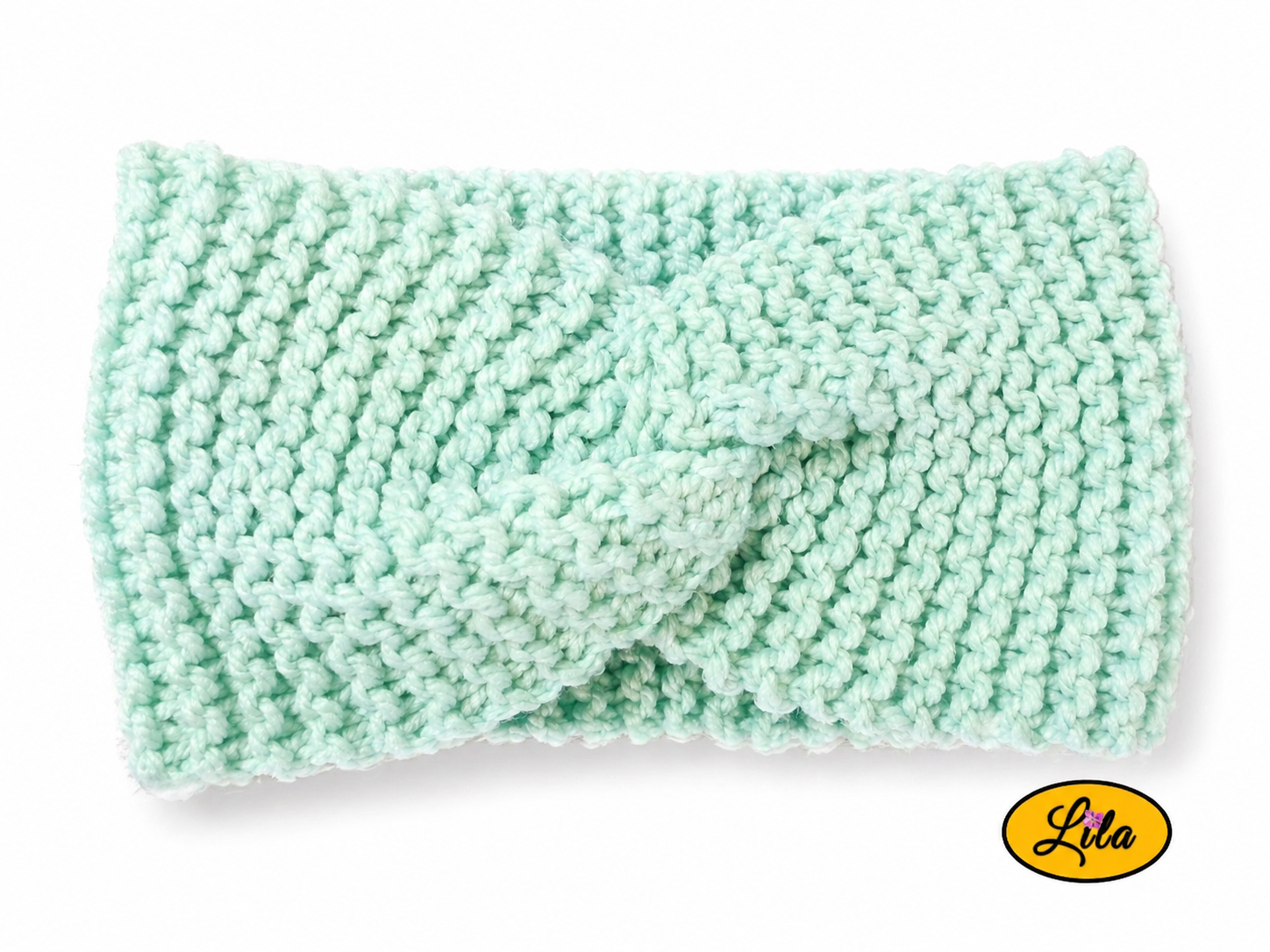 Bandeau en laine large vert pastel vue de face sur fond blanc style hiver doux et moderne