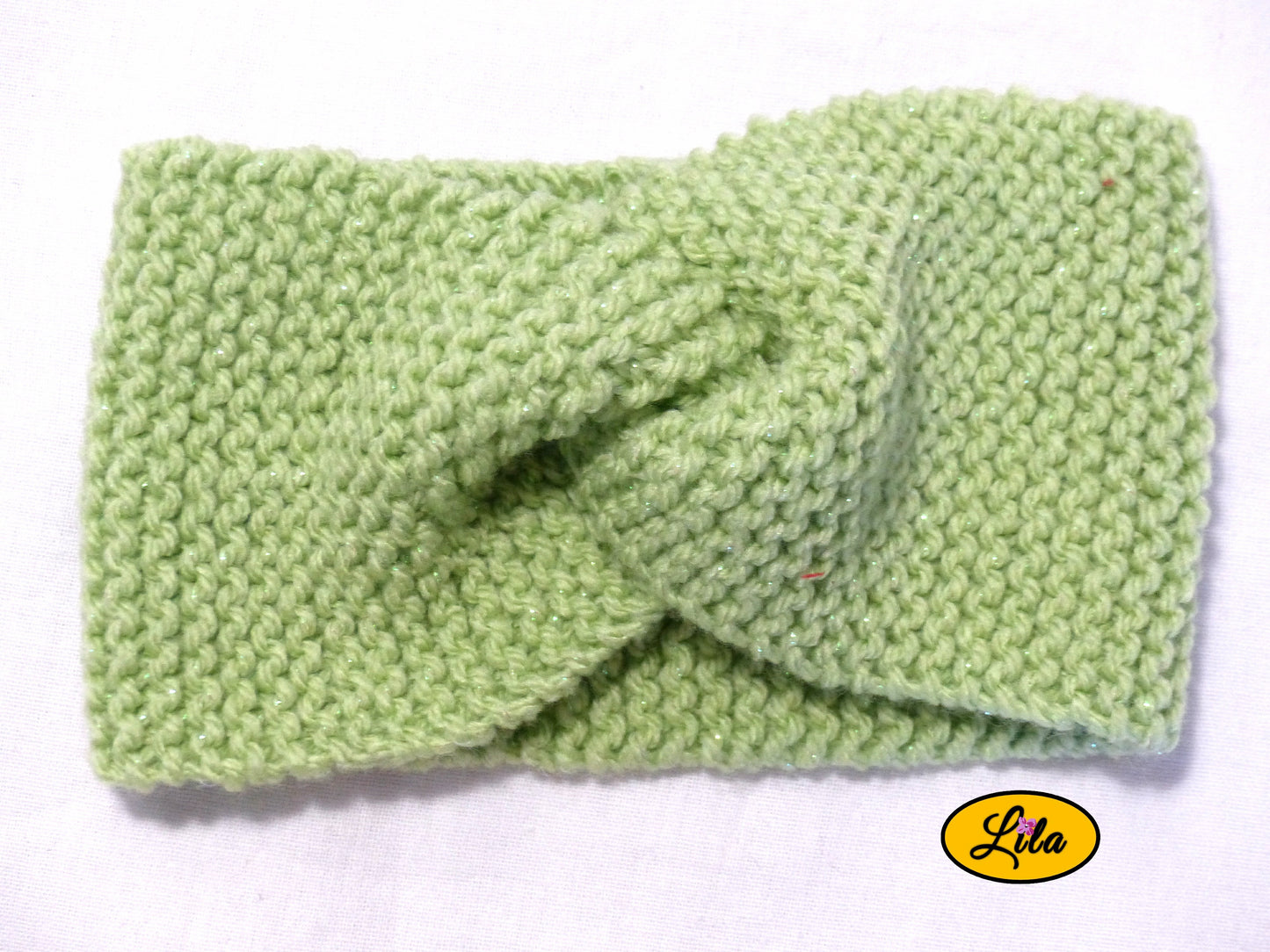 Bandeau en laine vert clair pailleté vue de face style hiver lumineux et tendance