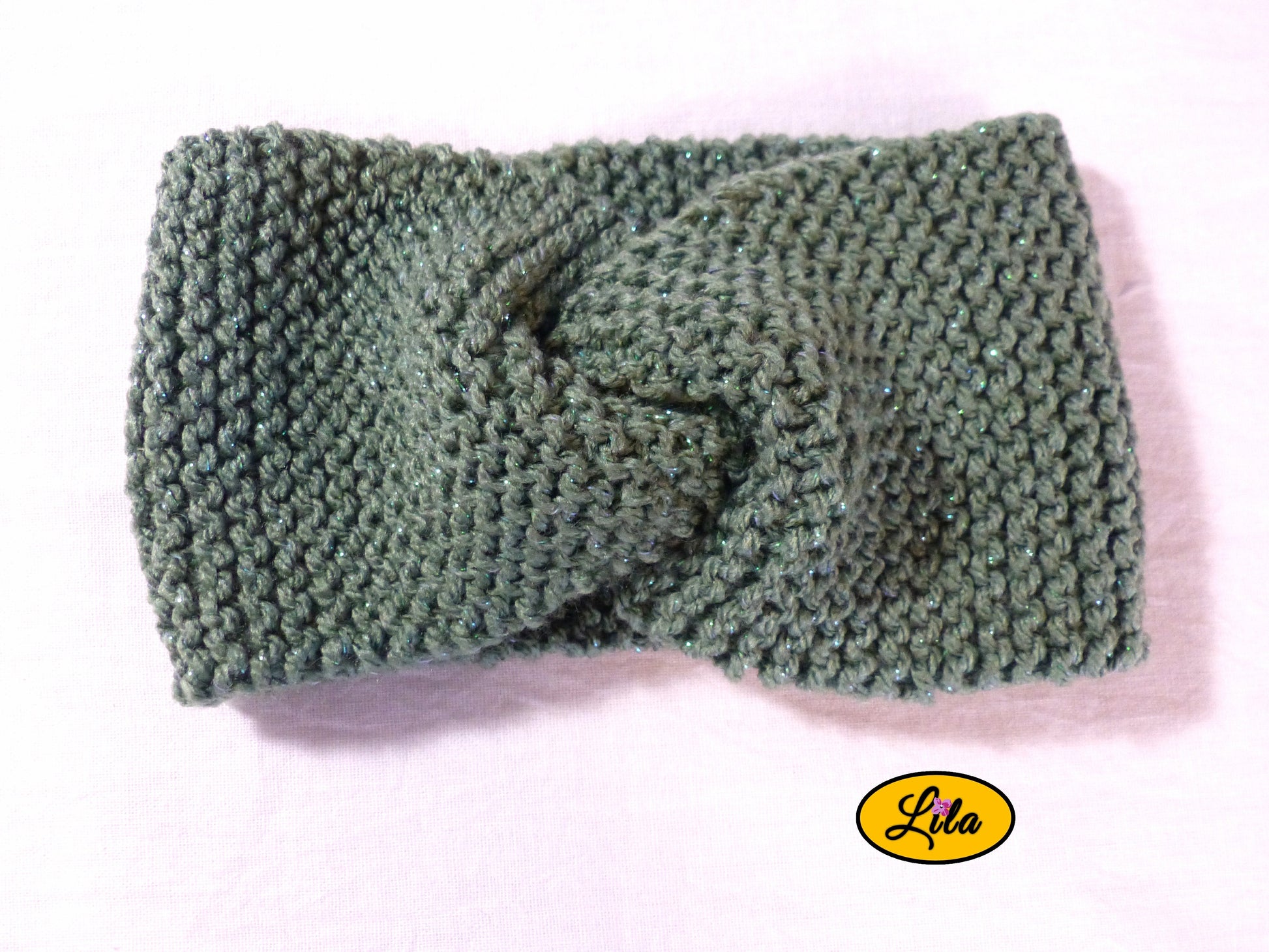 Bandeau en laine vert foncé pailleté vue de face style hiver élégant