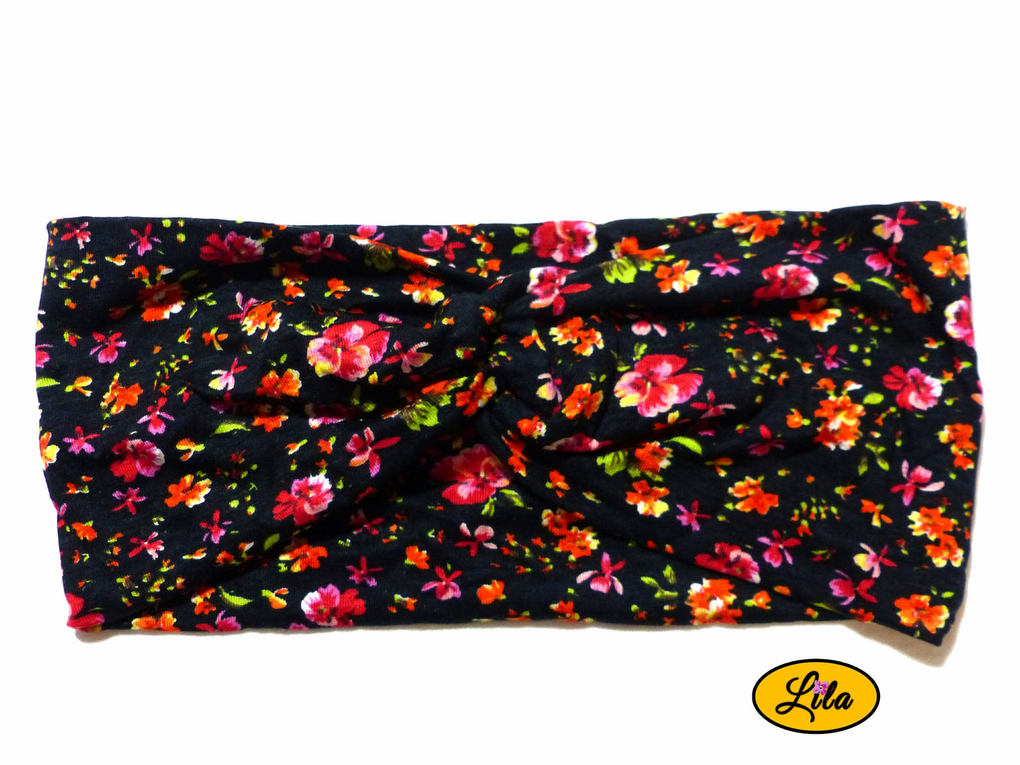 Bandeau en tissu noir à petites fleurs vu de face sur fond blanc style romantique et féminin