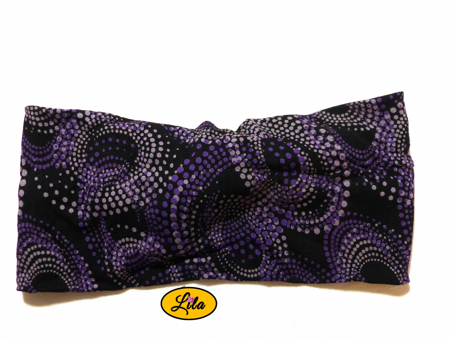 Bandeau en tissu noir à pois mauves vu de dos sur fond blanc style original et tendance
