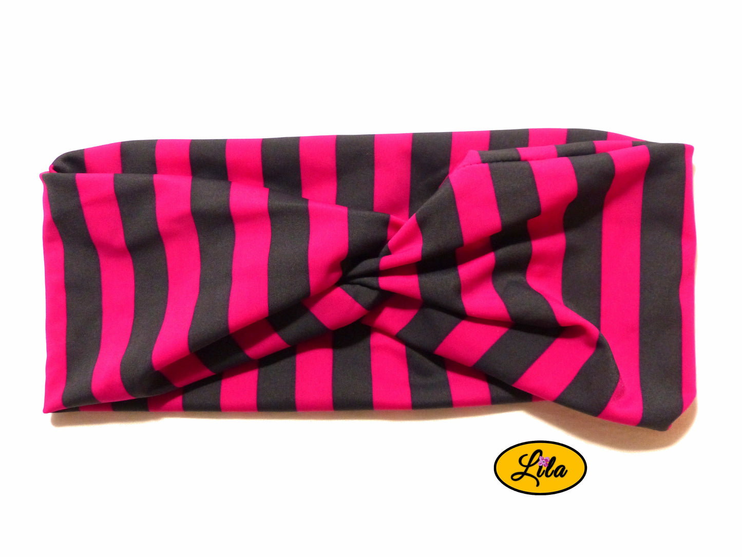 Bandeau en tissu rose fuchsia à lignes grises verticales vu de face sur fond blanc style moderne et féminin