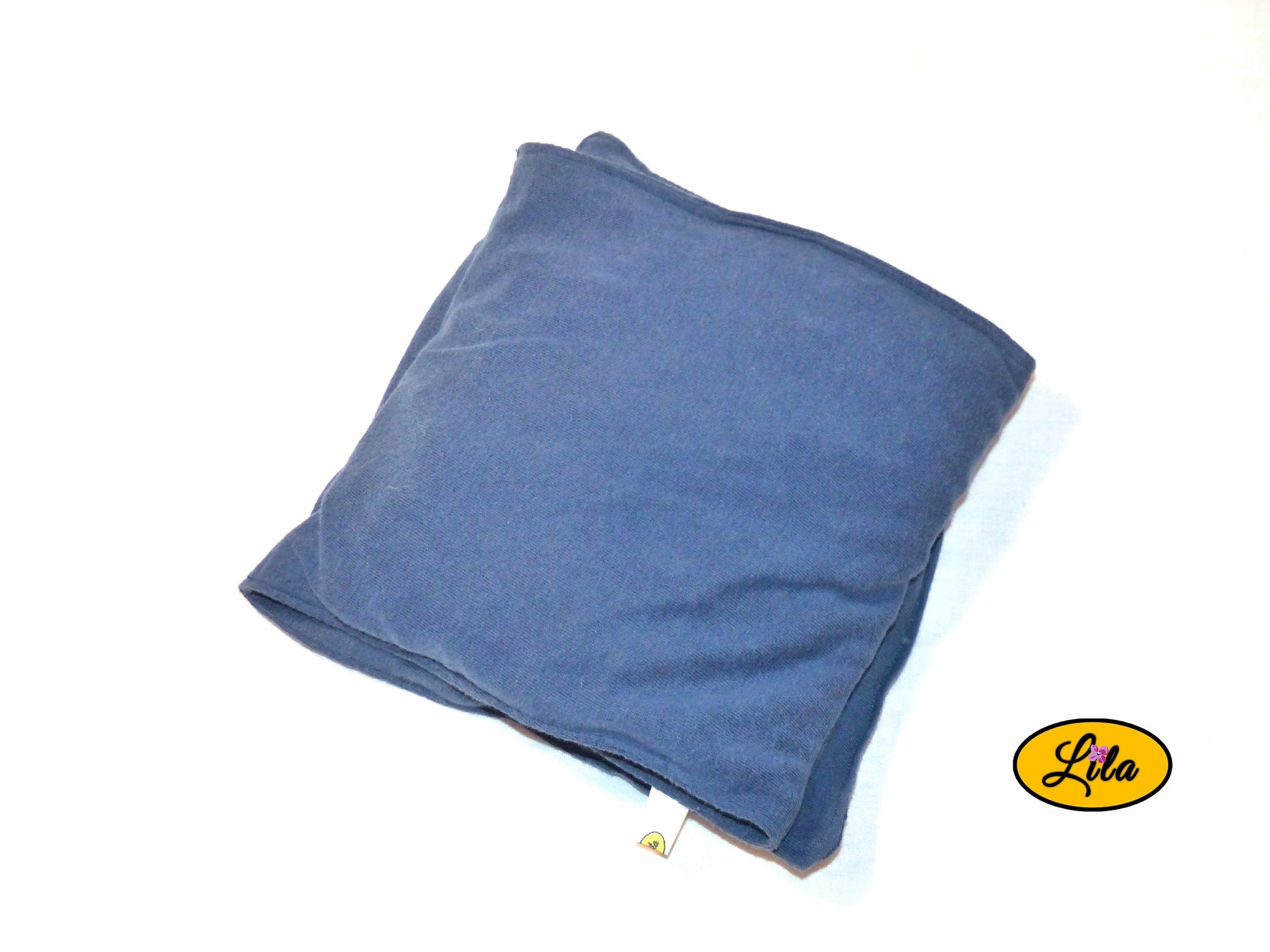 Bouillotte XL bleu marine pliée en un compartiment vue de dessus légèrement inclinée