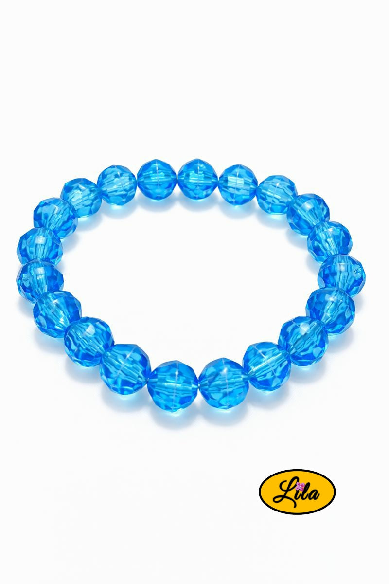 Détail bracelet grosses perles bleues vintage vue rapprochée