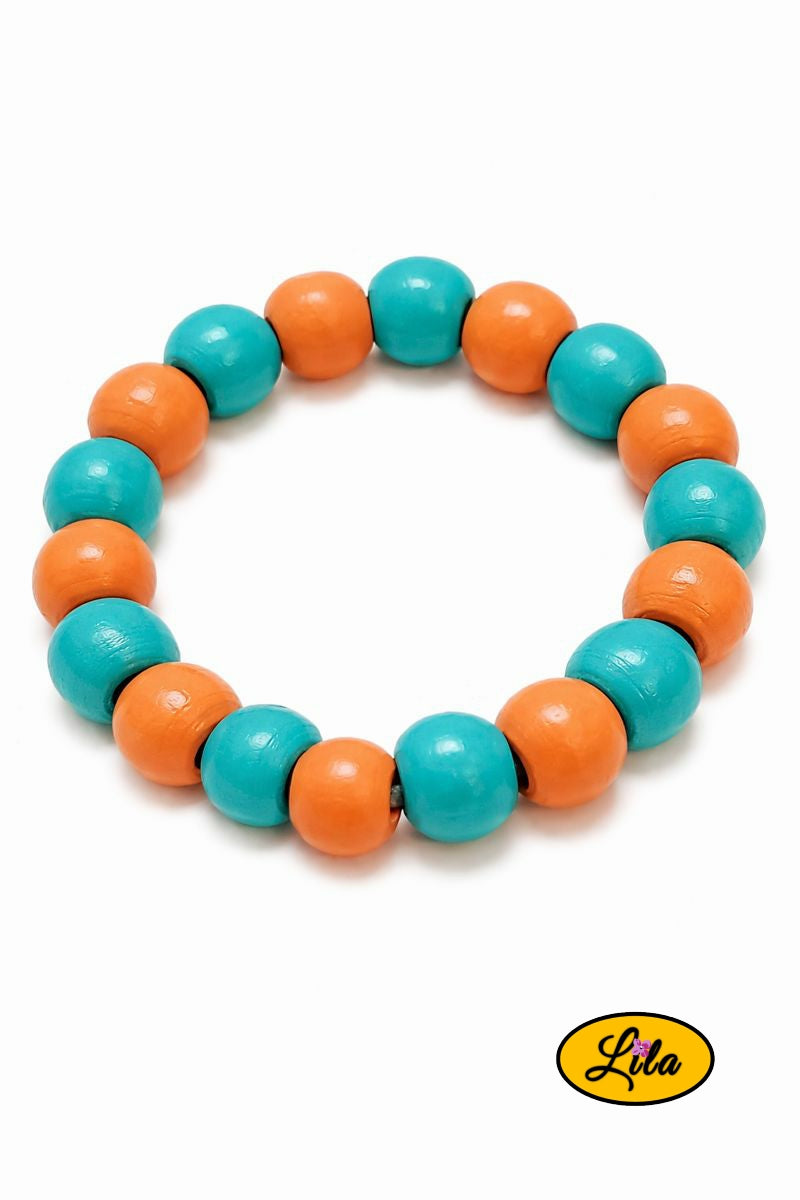 Bracelet perles bois bleu et orange alternées sur fond blanc vue produit