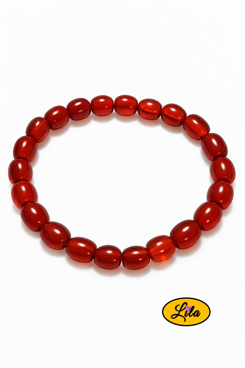 Détail bracelet perles ovales ambrées vue rapprochée
