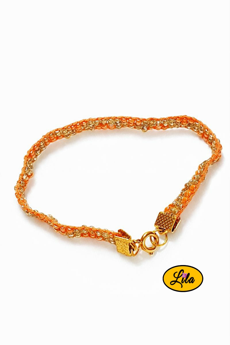 Bracelet perles de rocailles orange et doré vue alternative sur fond blanc