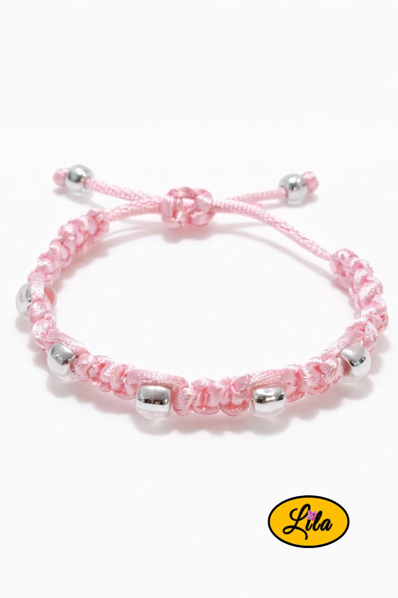 Bracelet Shamballa fil rose et perles transparentes sur fond blanc vue produit