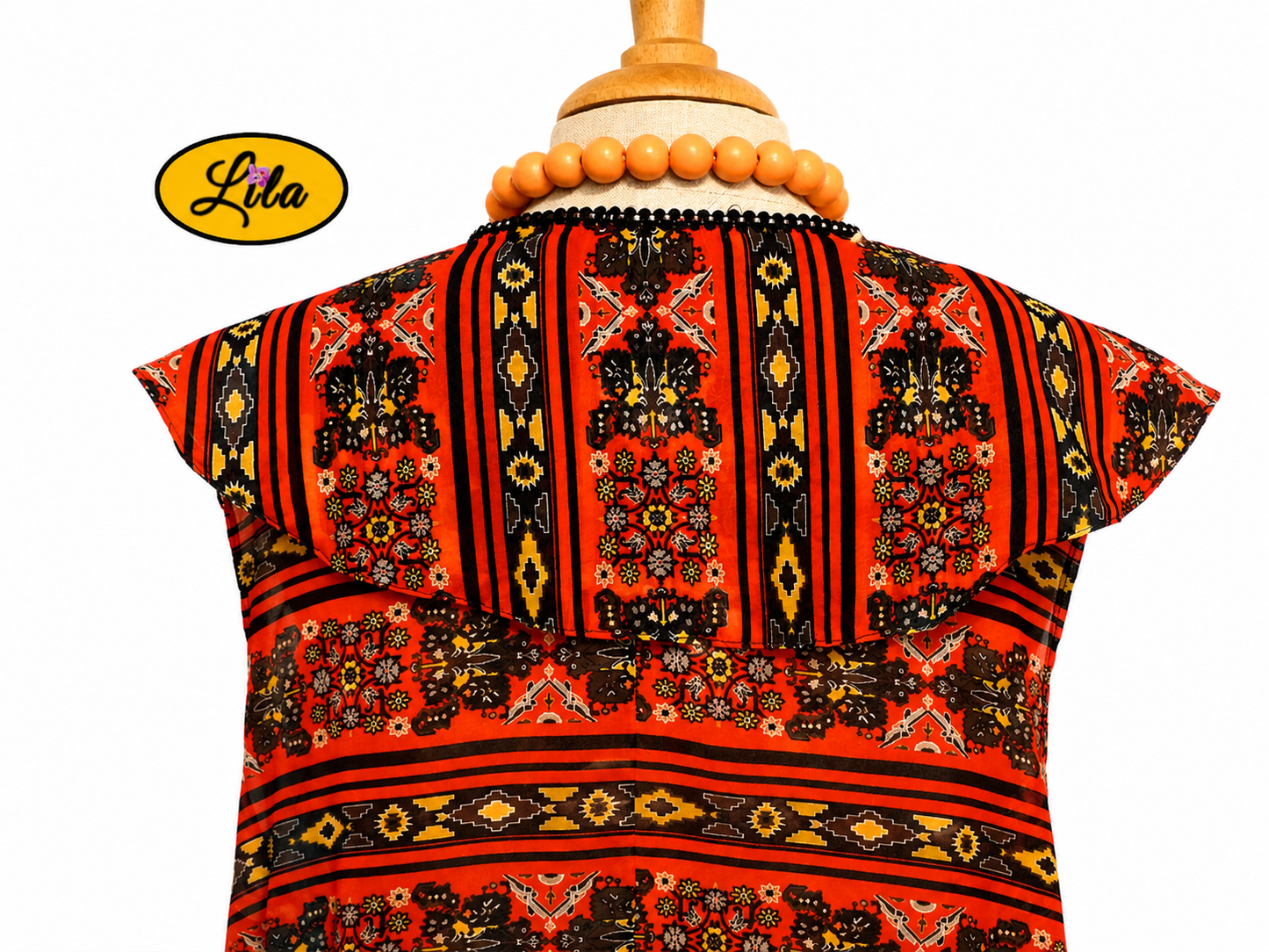 Zoom sur le col dos du chemisier Delphine sans manches en tissu léger orange et noir style rétro chic et féminin