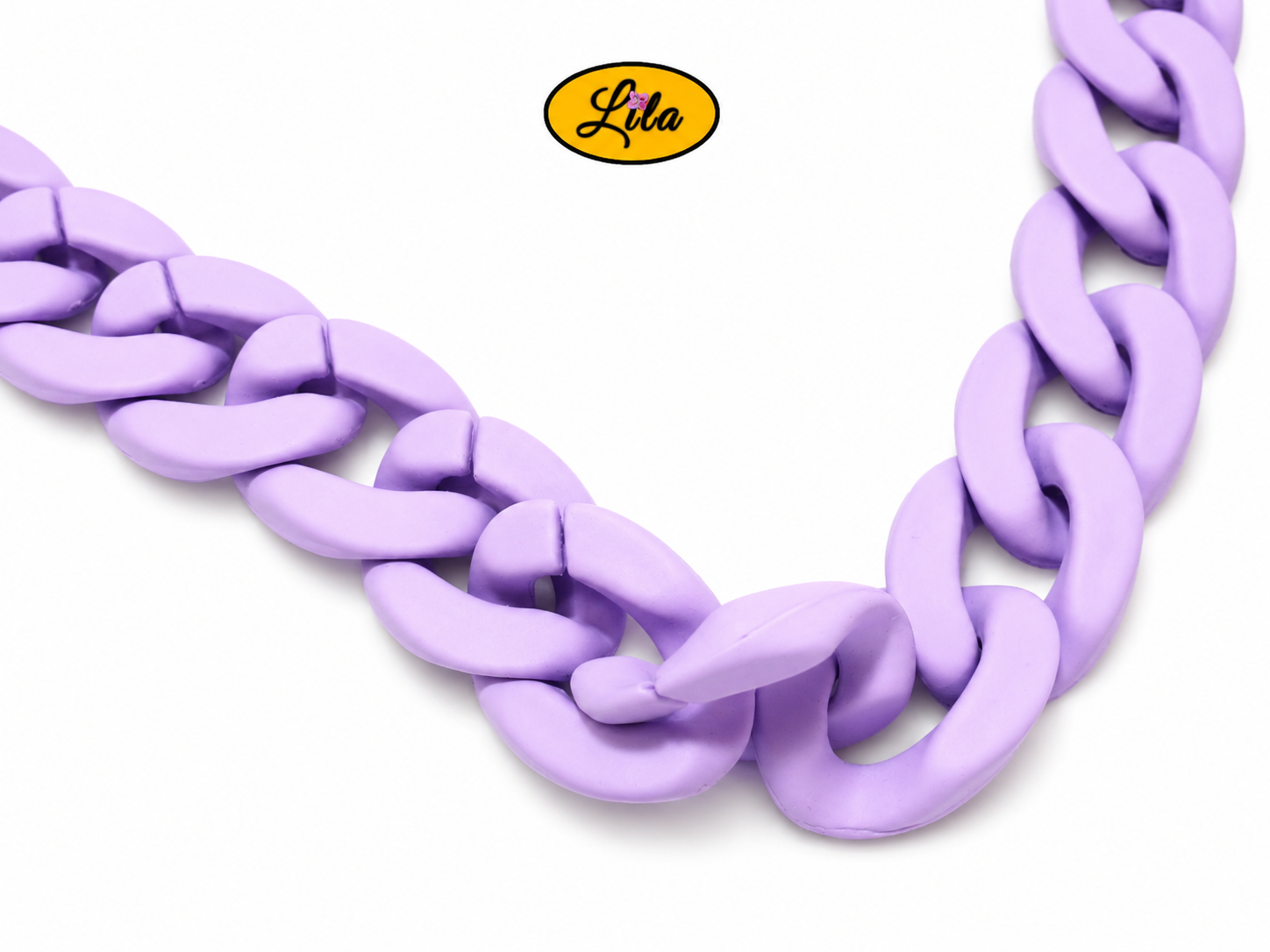 Zoom sur la chaîne lilas en grosse maille du petit sac à main aux brins lilas détail anse et finition originale