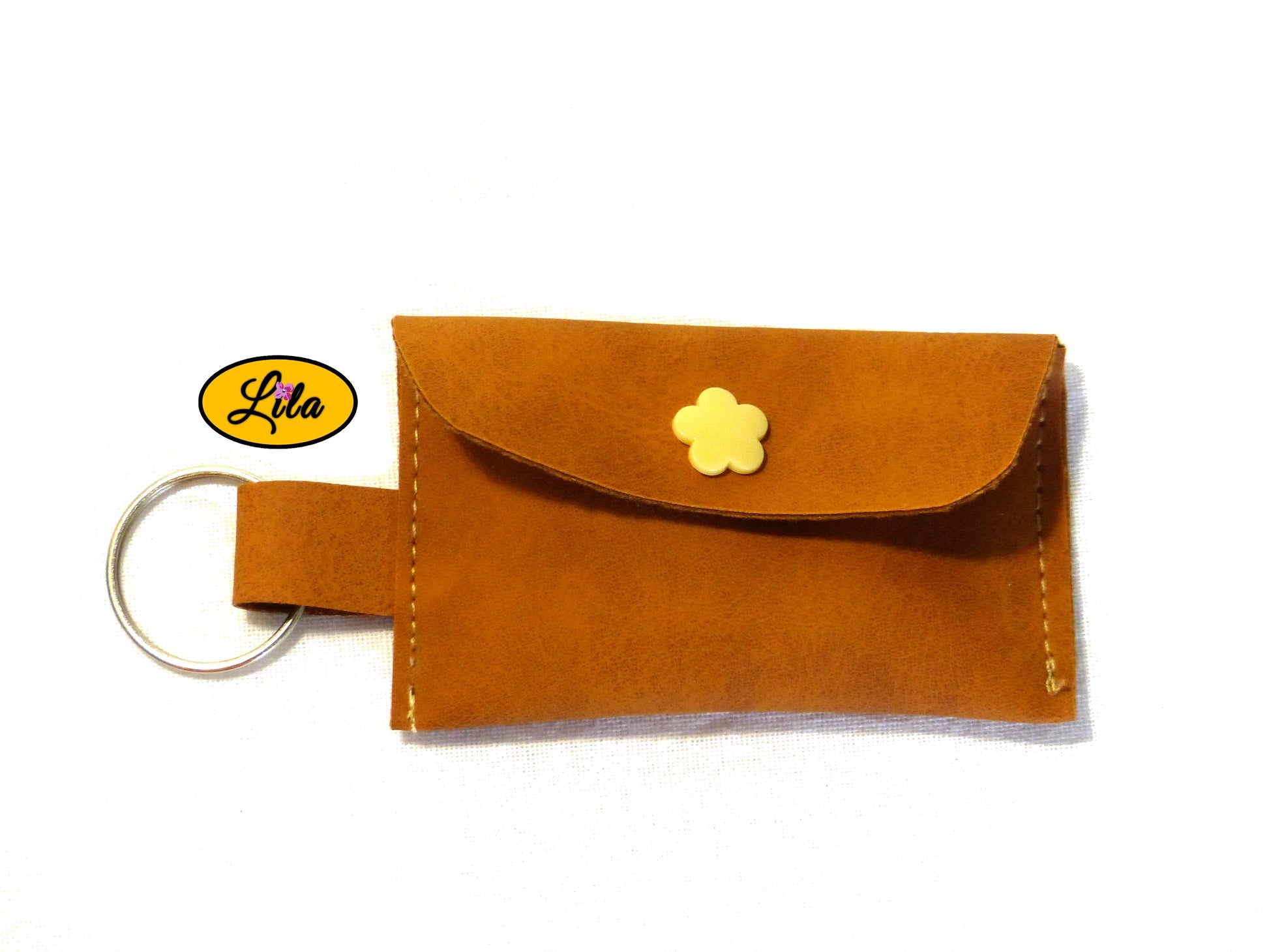 Porte-clé mini pochette brune en simili cuir vue de face