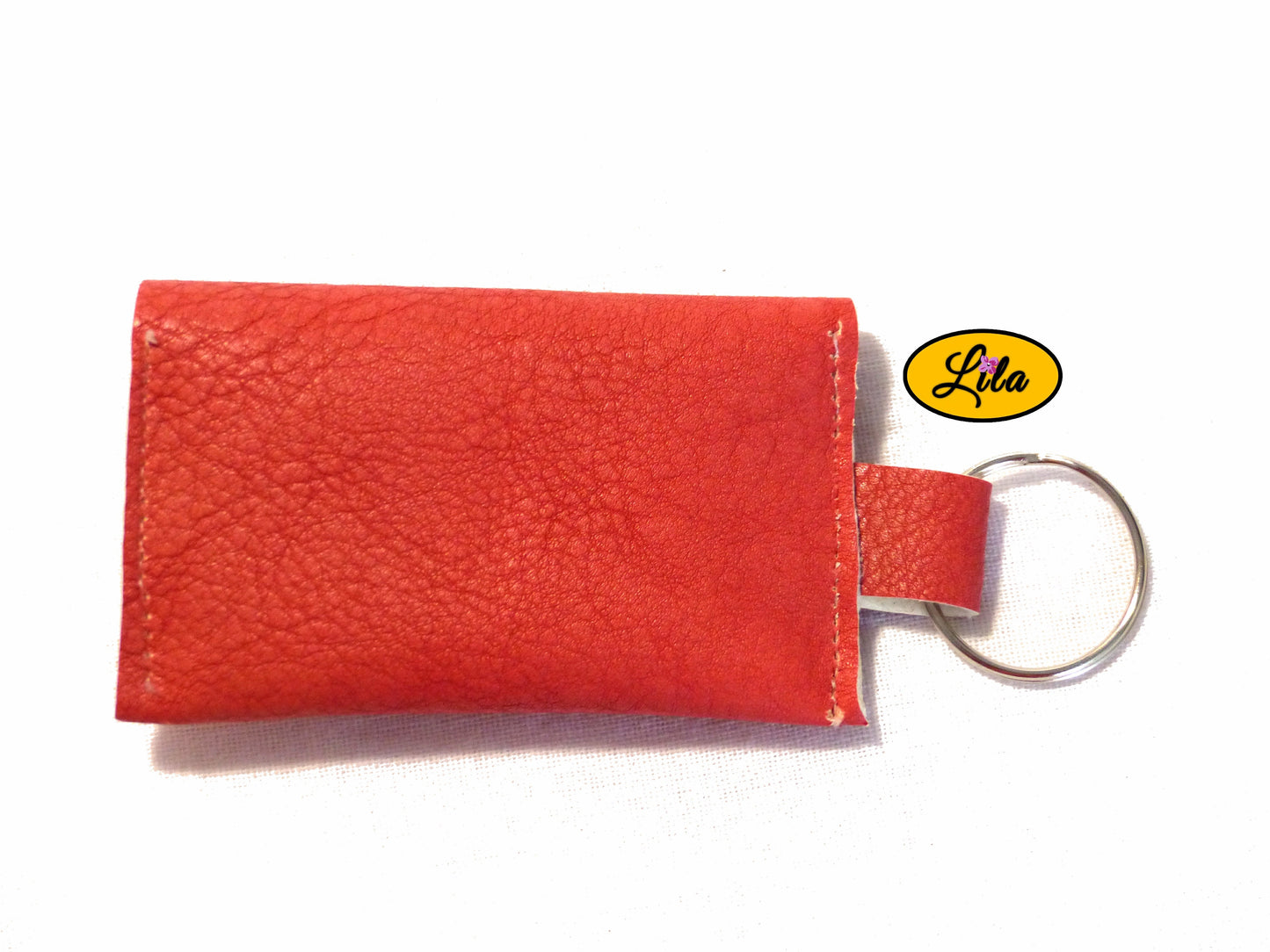 Porte-clé mini pochette rose en simili cuir vue de dos