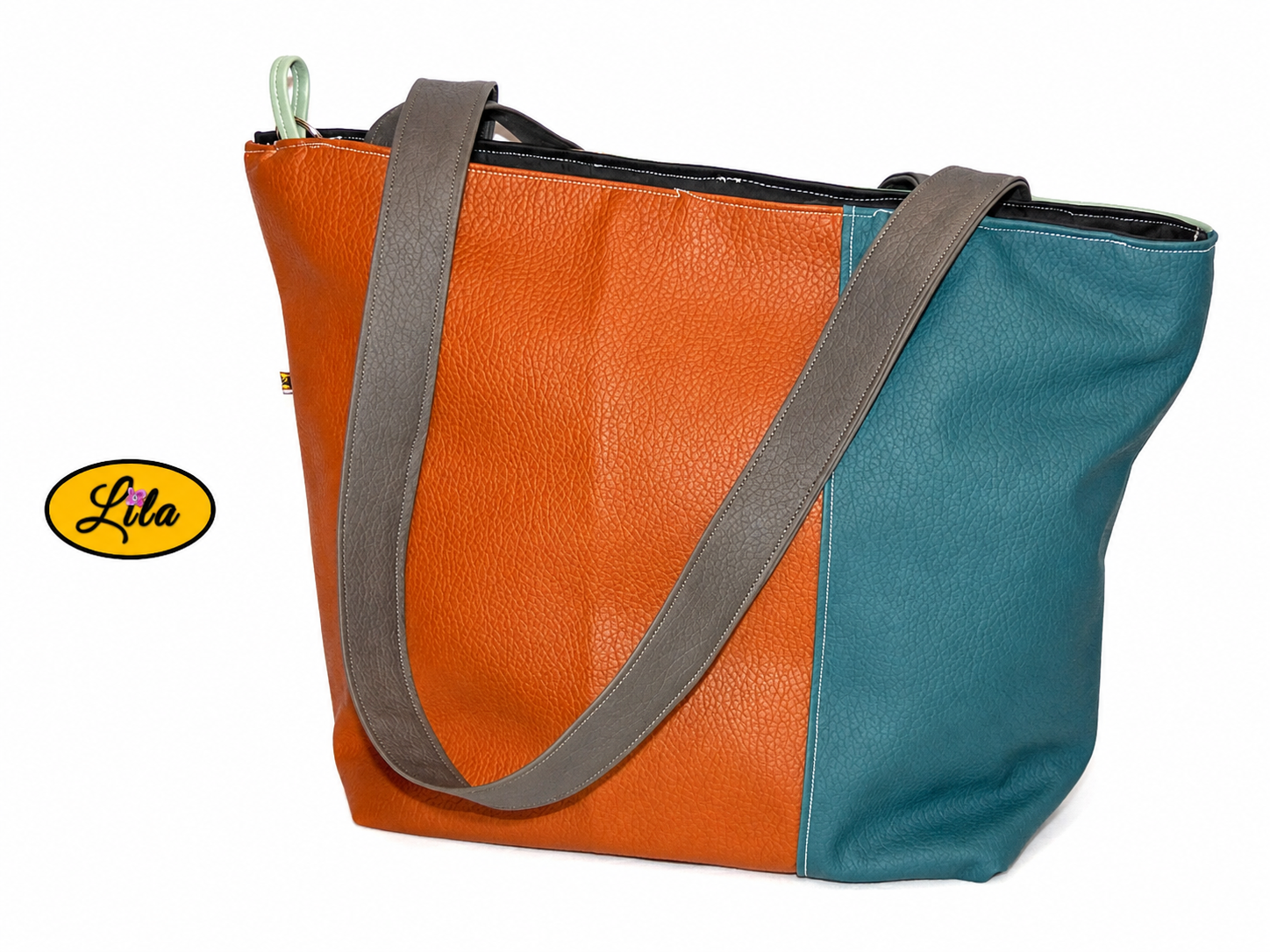 Sac 4 saisons en simili cuir brun et turquoise sur fond blanc style graphique et tendance