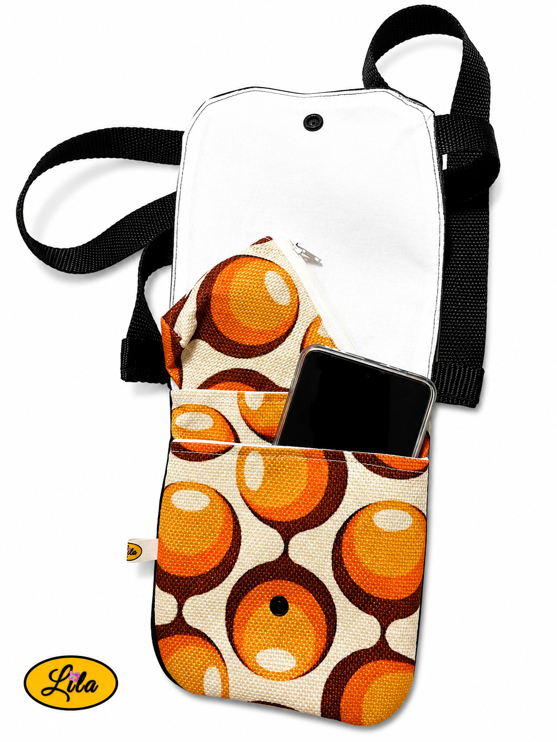 Sac bandoulière pour téléphone en jeans noir ouvert avec téléphone portable dans la poche avant et porte-monnaie dans la poche arrière montrant les différentes possibilités de rangement