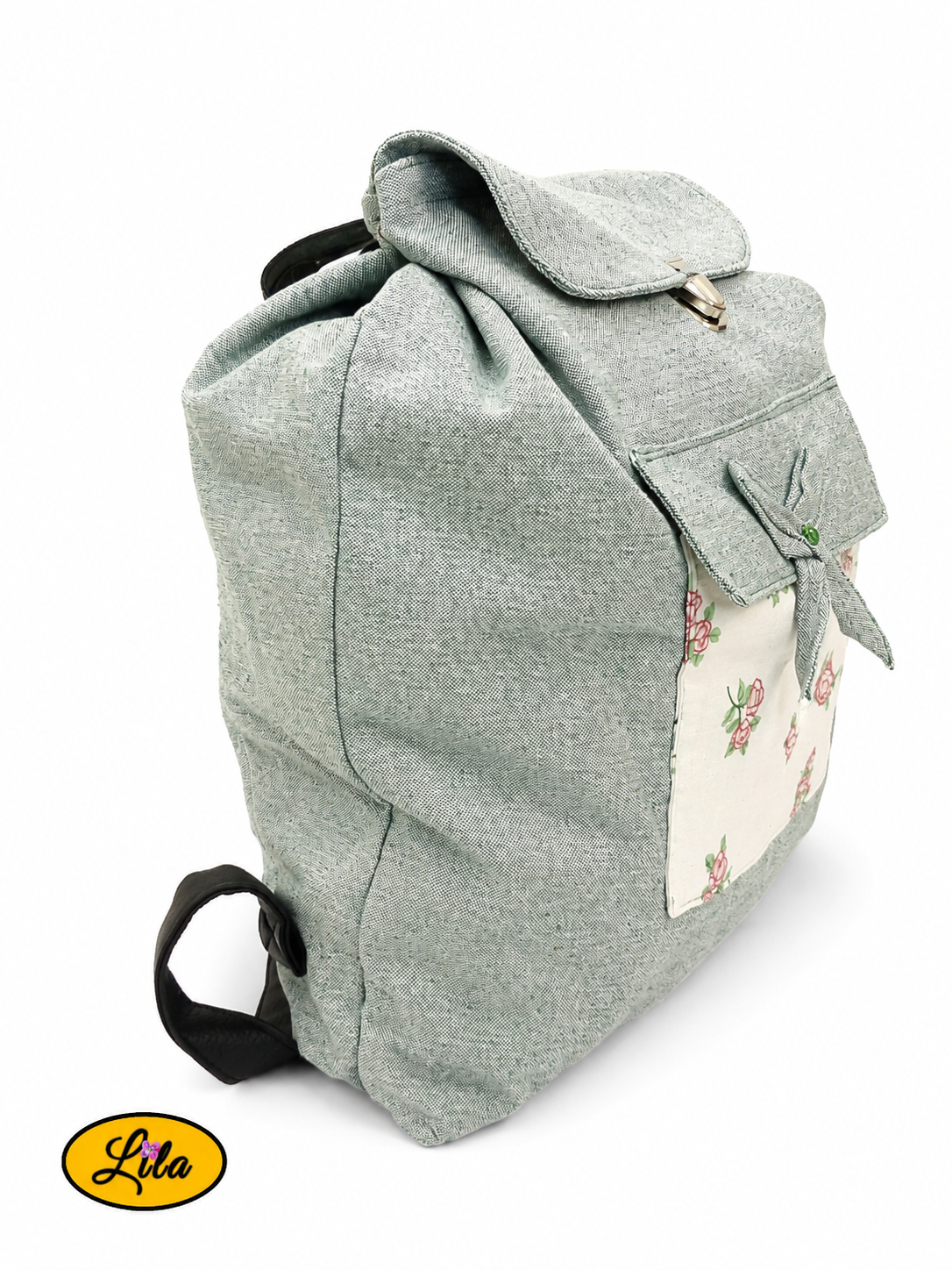 Sac à dos vert avec poche fleurie vue de profil droit sur fond blanc