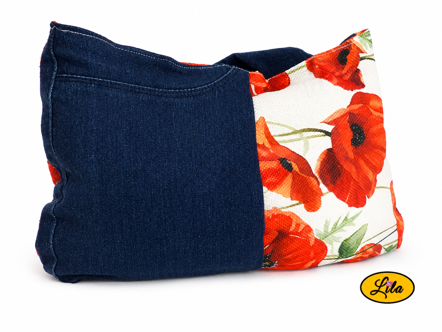 Sac à main en jeans et tissu vintage motif coquelicot vue de dos sur fond blanc avec sangle dissimulée à l’arrière