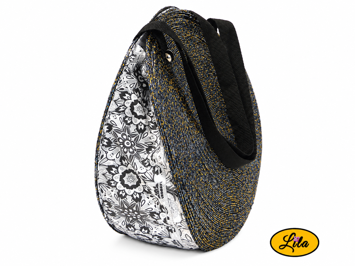 Sac à main en sets de table ronds pailletés profil droit avec doublure en tissu blanc à motifs noirs visible entre les deux faces du sac