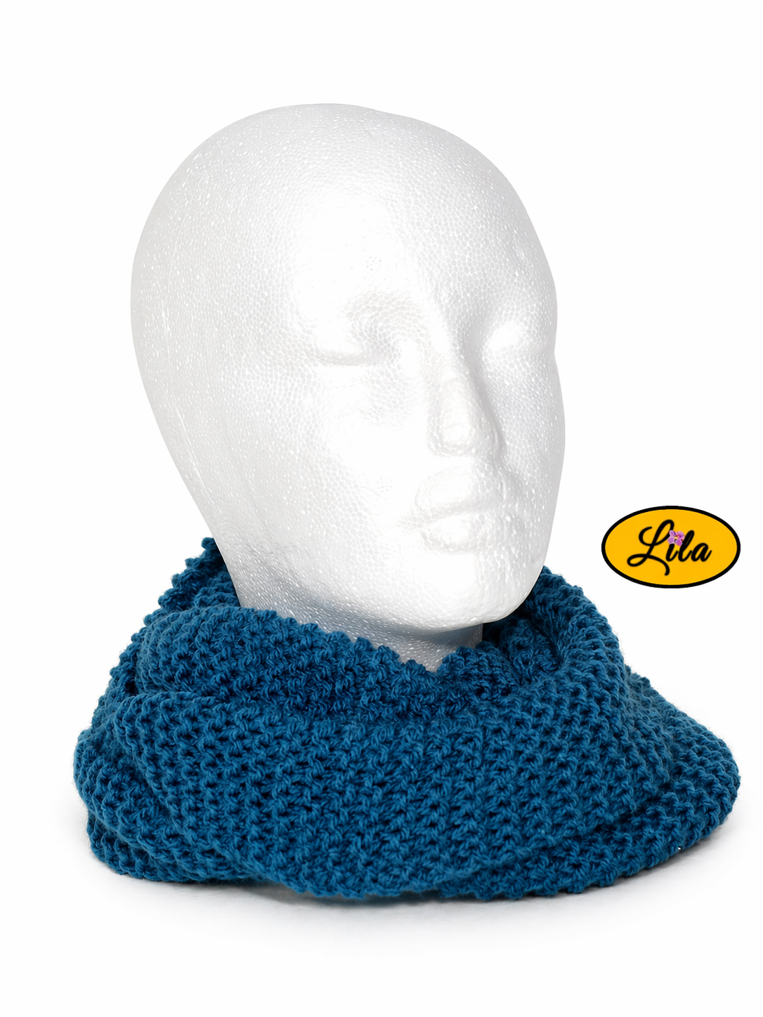 Snood en laine bleu turquoise présenté sur une tête de mannequin