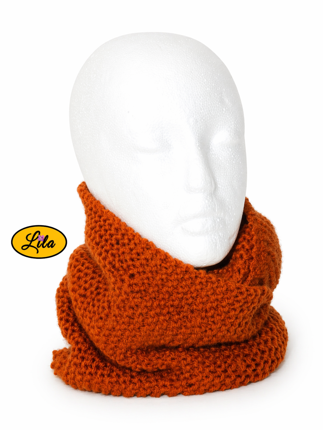 Snood en laine couleur rouille présenté sur une tête de mannequin