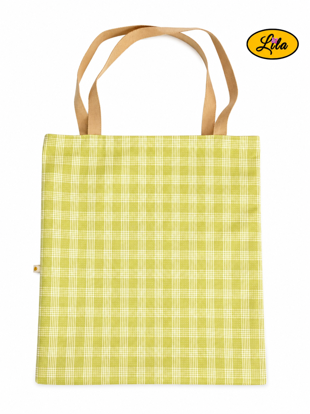 Tote bag en tissu à carreaux verts et blancs style vintage vu à plat de haut sur fond blanc avec sangles brun crème placées au-dessus du sac style rétro et artisanal