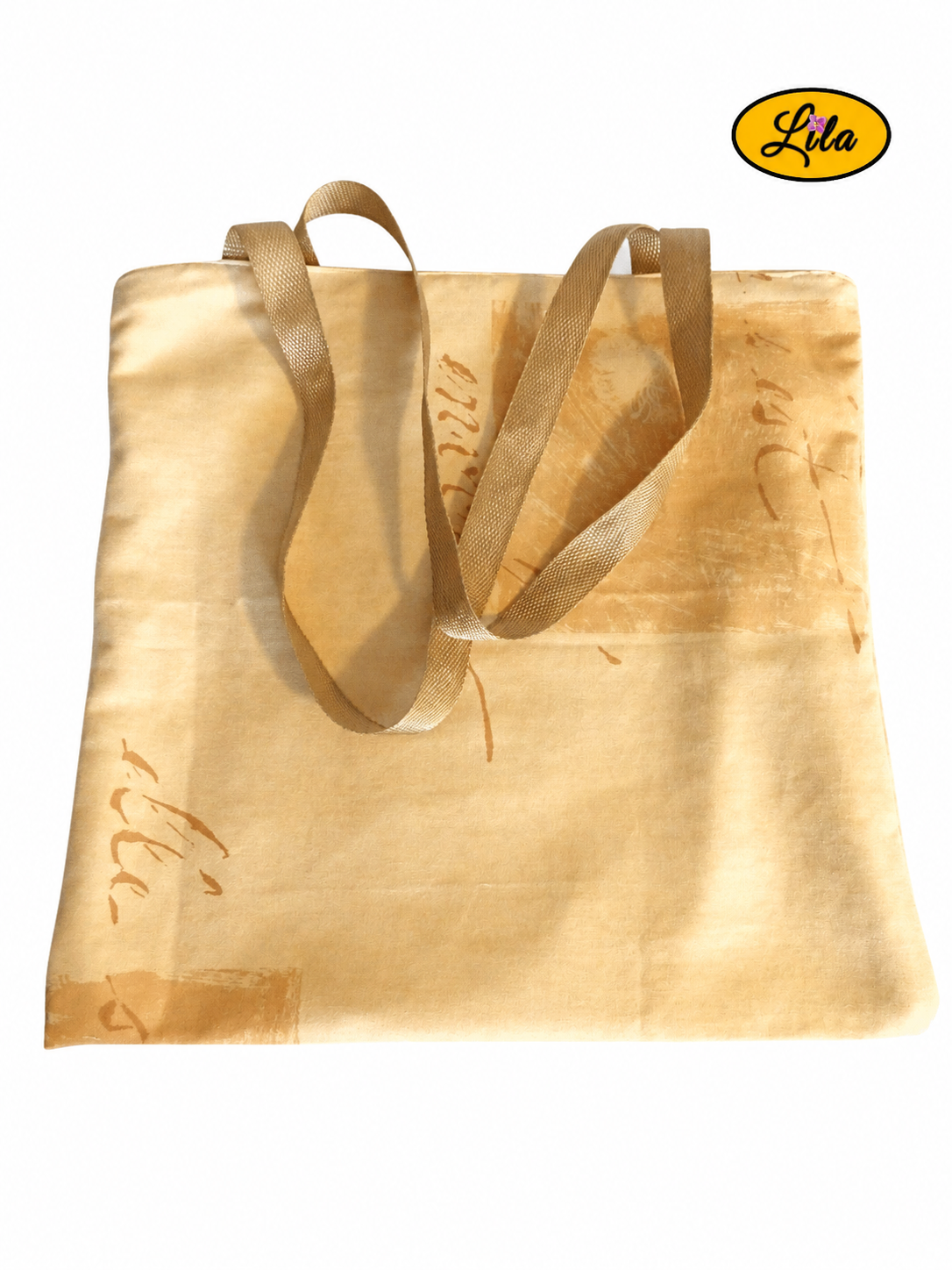 Tote bag jaune vu de dos en vue de haut sur fond blanc avec les sangles posées sur le sac style artisanal et élégant