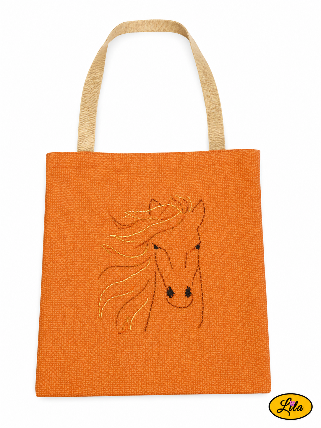 Tote bag orangé vu à plat de haut sur fond blanc avec sangles couleur sable placées au-dessus du sac et broderie représentant un cheval sur le devant style artisanal et équestre