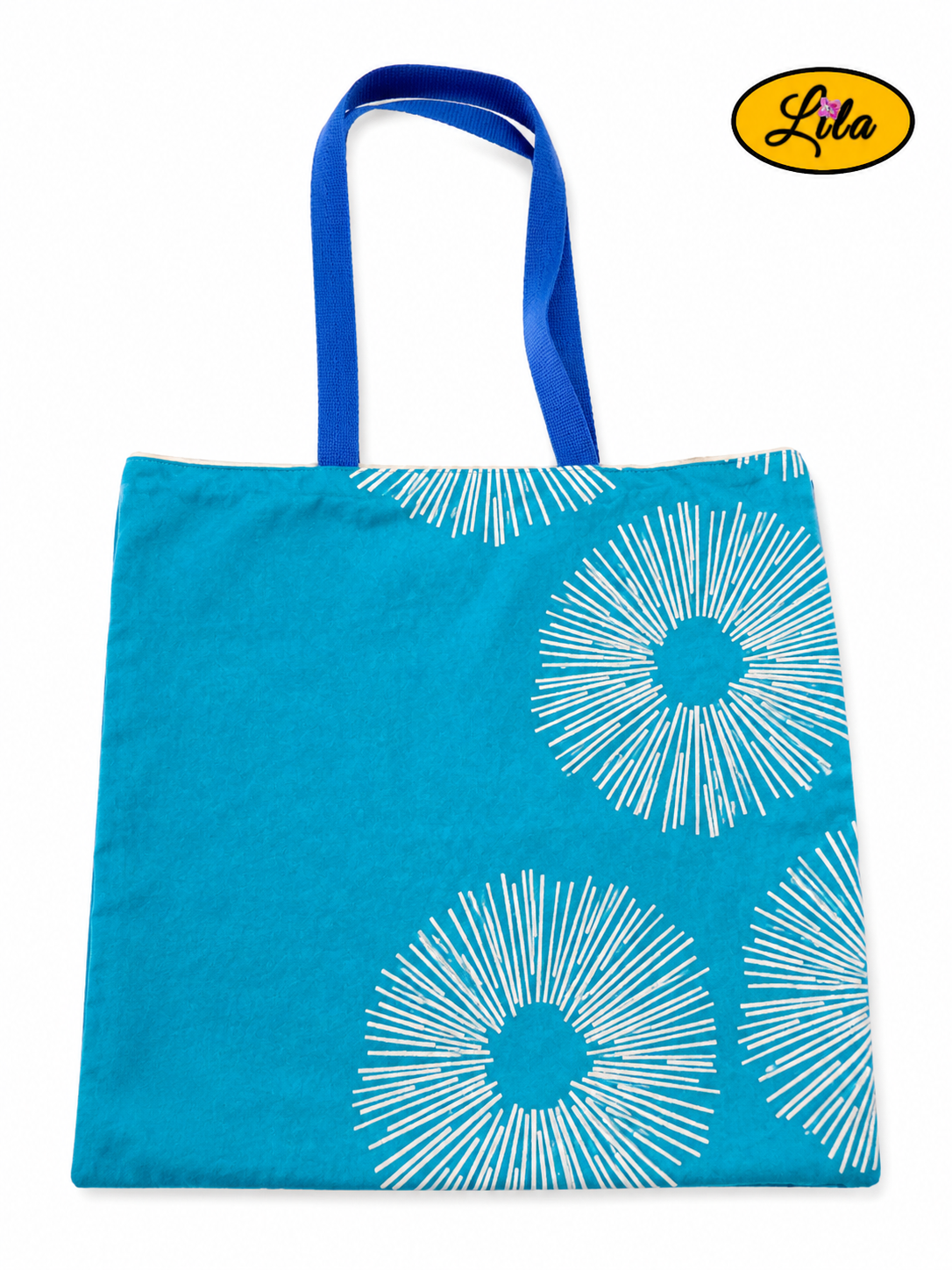 Tote bag bleu turquoise vu à plat de haut sur fond blanc avec sangles assorties placées au-dessus du sac et trois soleils géométriques argentés visibles dans le bas gauche style moderne et artisanal