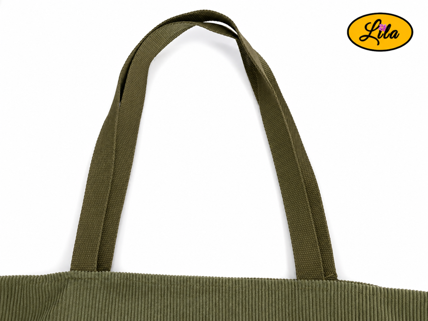 Zoom sur les sangles kaki d’un tote bag en velours côtelé kaki sur fond blanc style artisanal et soigné