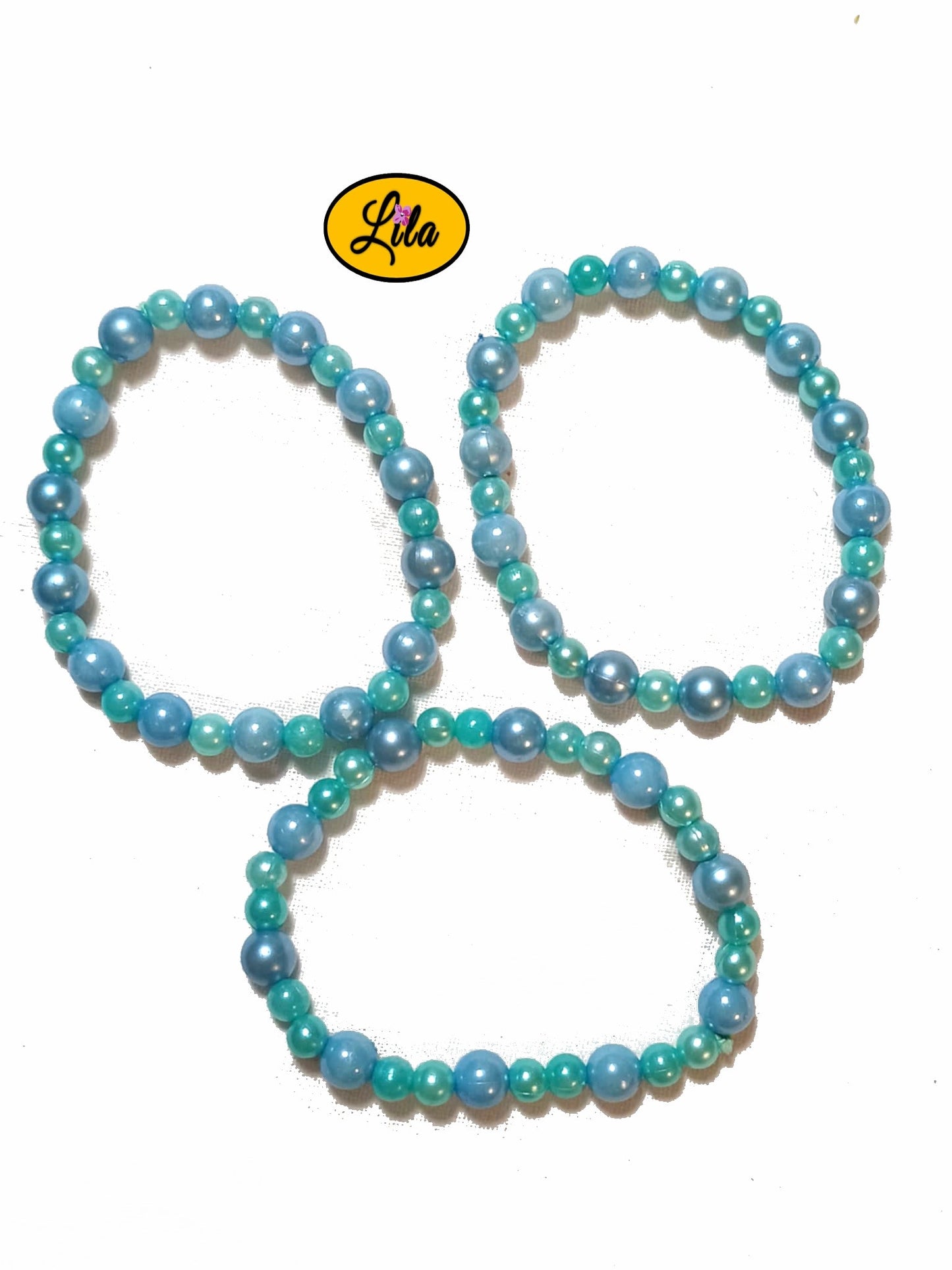 Trio de bracelets perles rondes vertes et bleues sur fond blanc vue produit